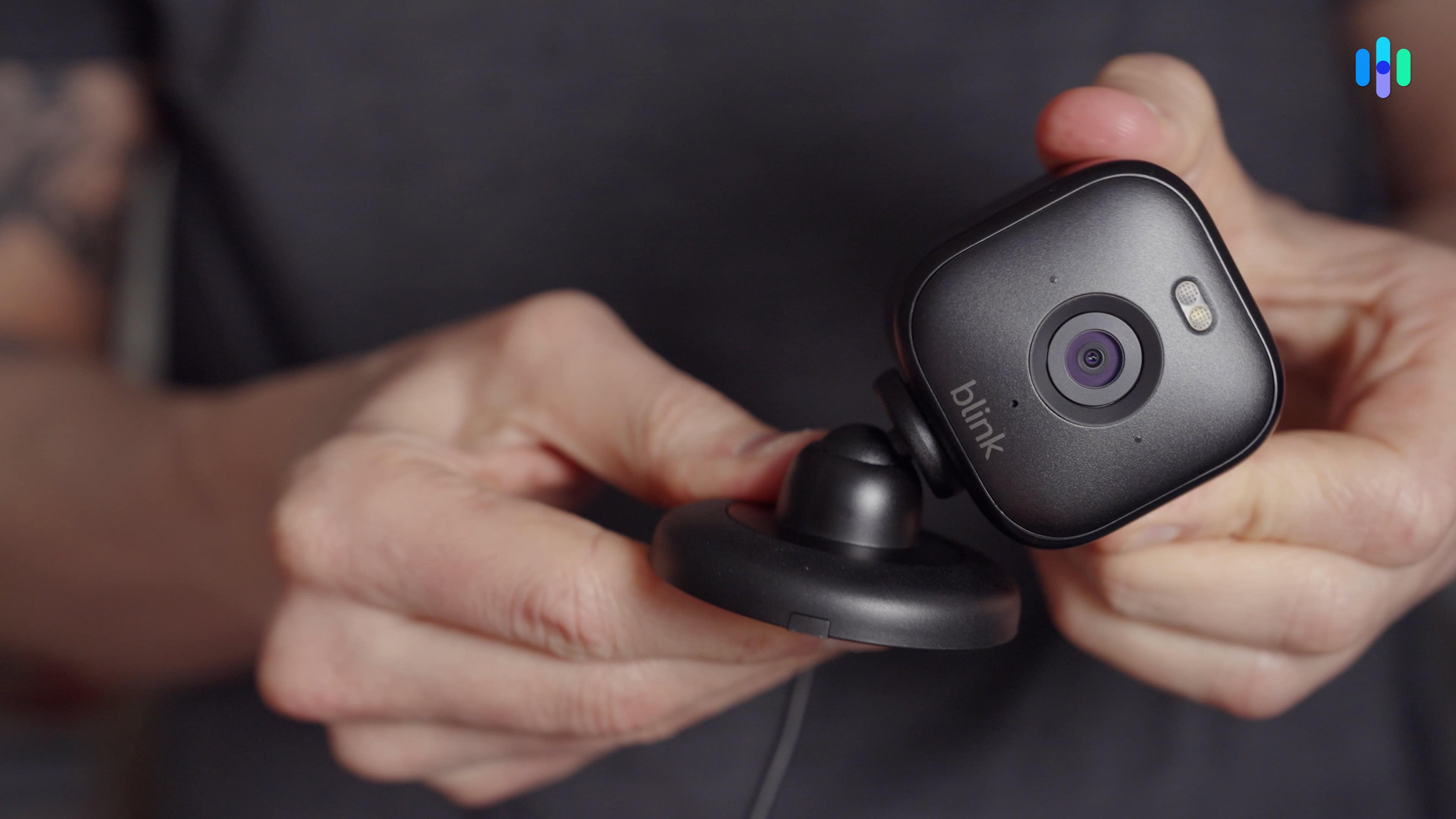 Adjusting the Blink Mini 2 Our tester adjusting the Blink Mini 2’s rotating mount before installation