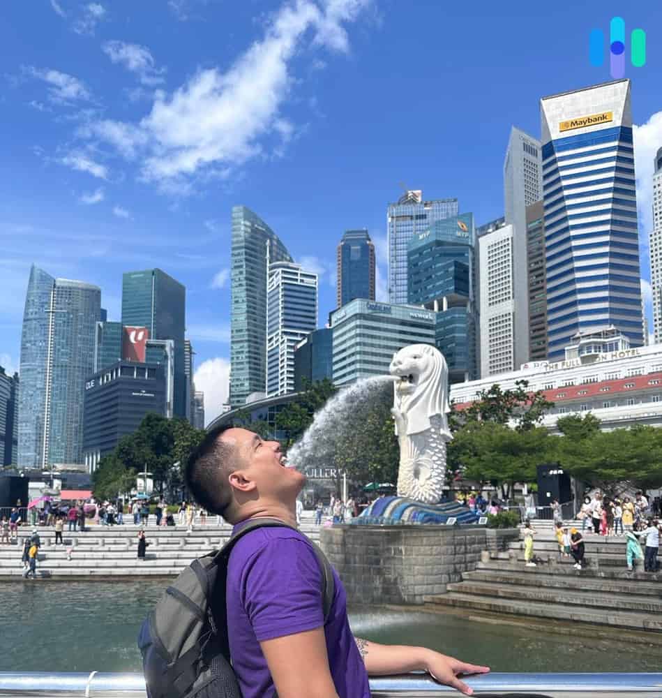 Our VPN expert, Brett, posing in front of the Merlion statue Our VPN expert, Brett, posing in front of the Merlion statue